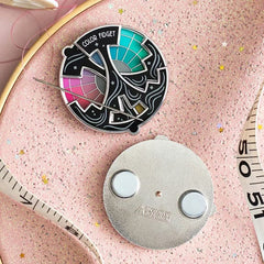 SpinGleam – Interactive Colorful Fidget Pin