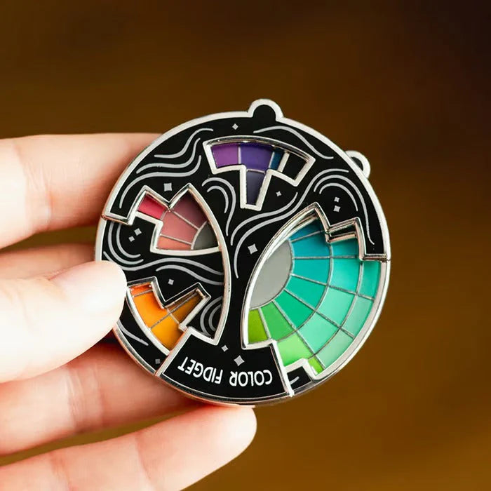 SpinGleam – Interactive Colorful Fidget Pin